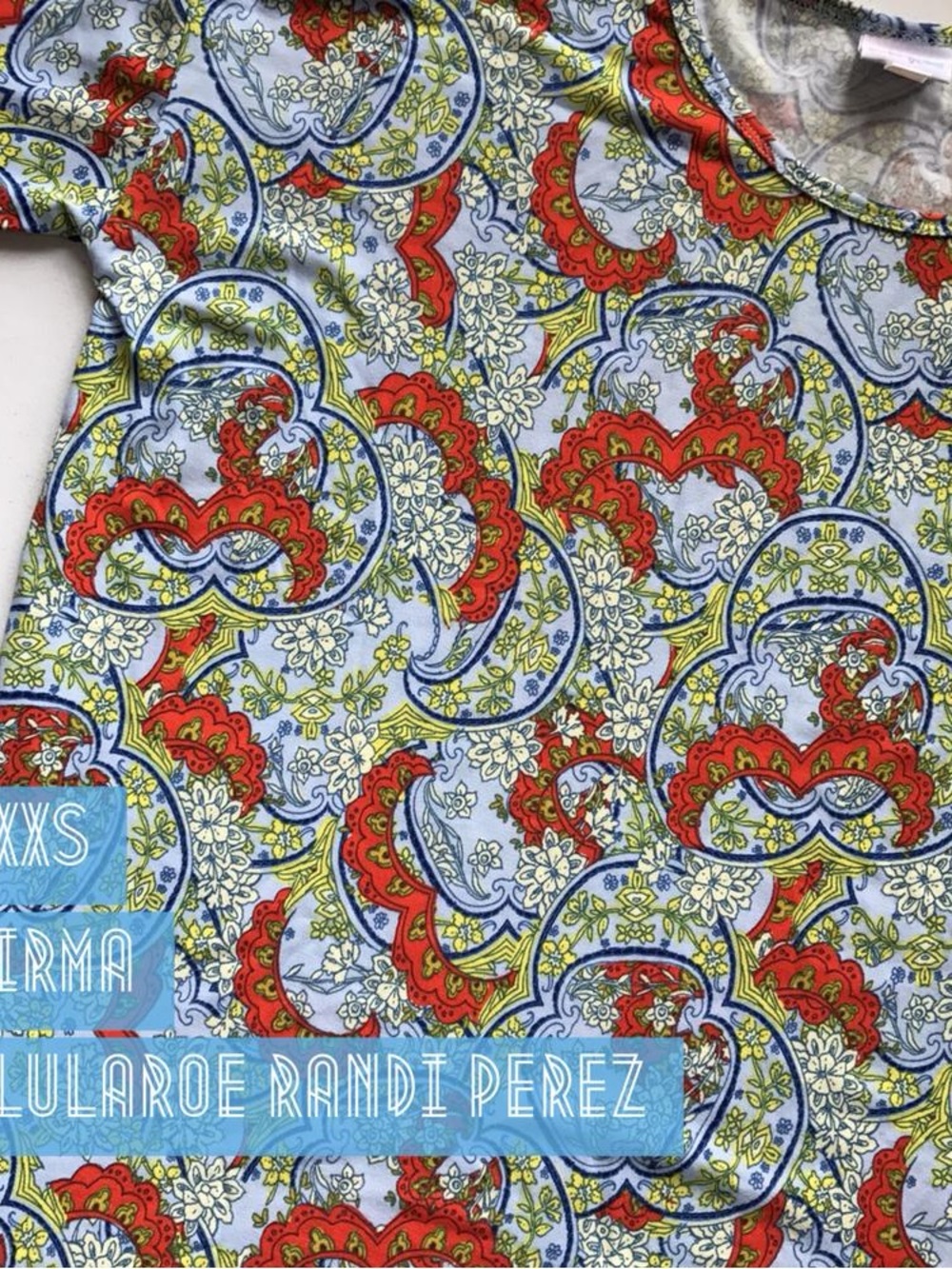 LuLaRoe Women's Irma Tunic in Light Blue with Red & Yellow Paisley